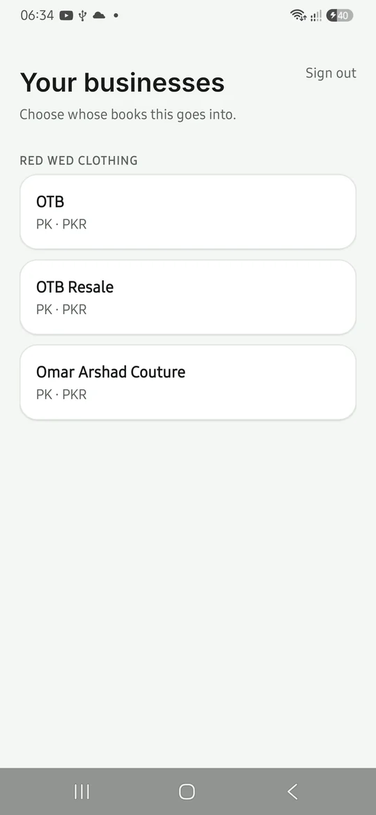 The business picker in the Alevate Books app, showing brands grouped under their holding company